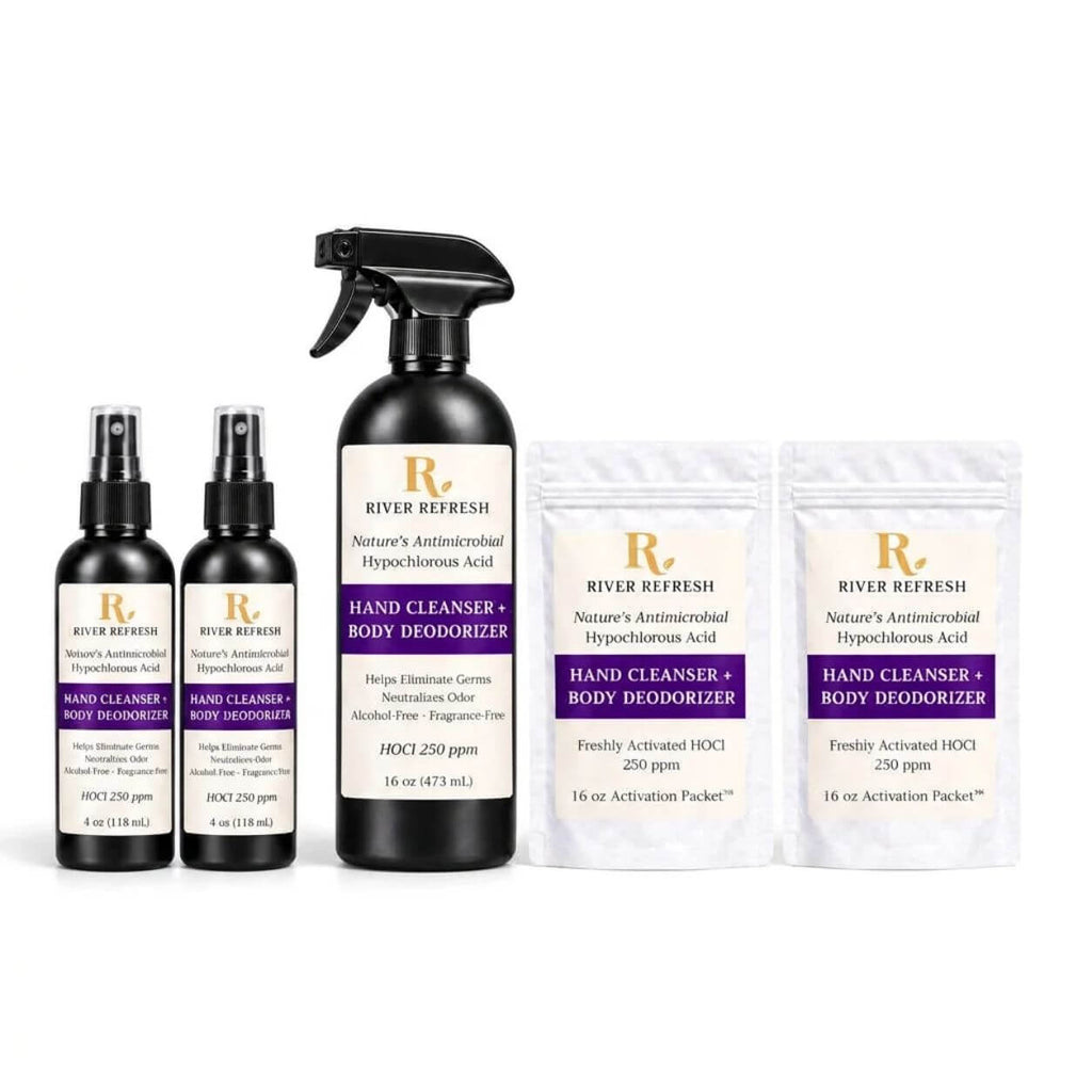 River Refresh Hypochlorous Acid Hand Cleanser + Body Deodorizer 32oz Starter Kit products arranged on a white background: two 4oz black travel spray bottles, one 16oz black mixing spray bottle, and two 16oz Activation Packet white pouches standing up. The labels read River Refresh Hand Cleanser + Body Deodorizer, with Nature's Antimicrobial Hypochlorous Acid and HOCl 250 ppm visible.