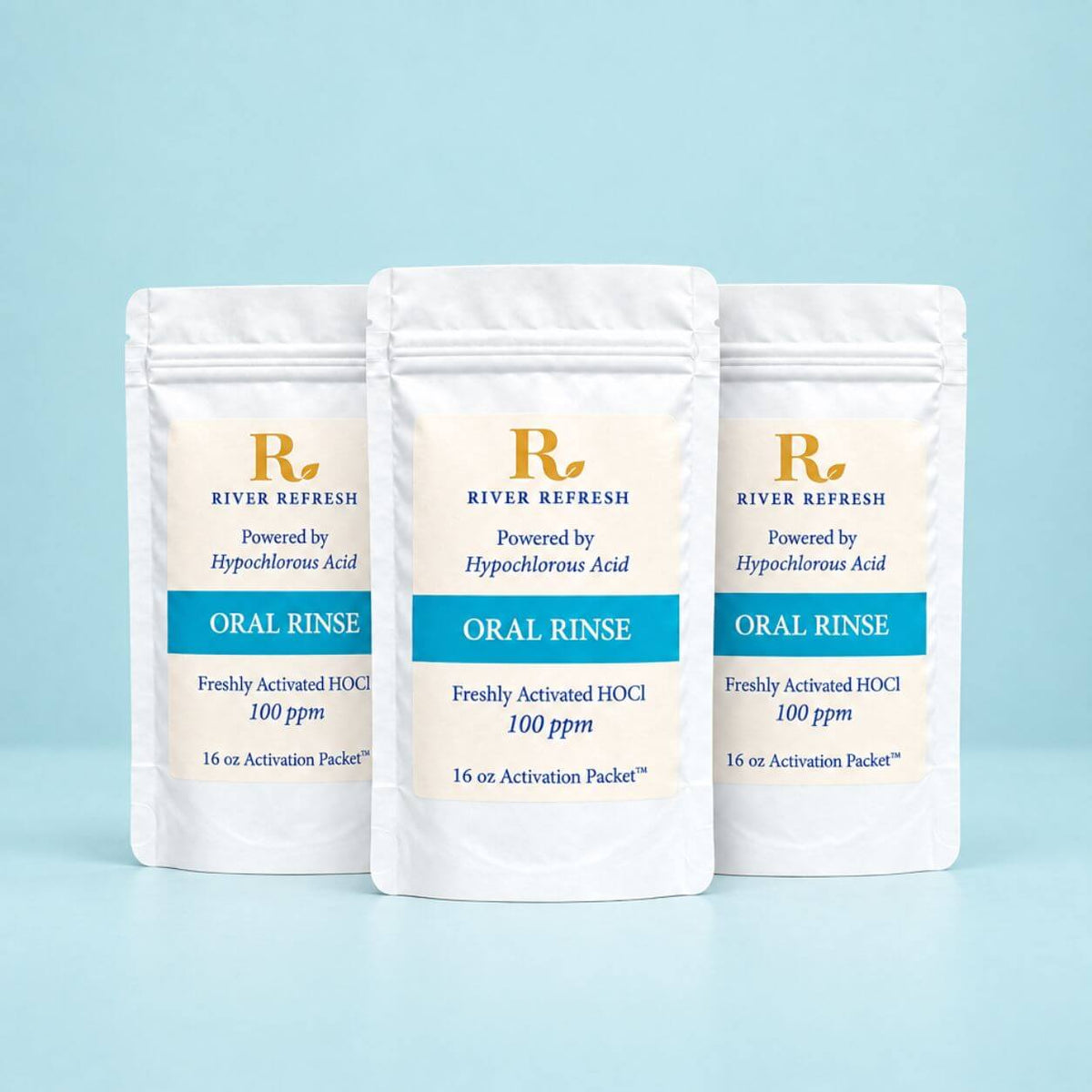 River Refresh Oral Rinse Refill set including three activation packets on a light reflective surface. For Product Page