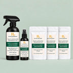 River Refresh Pet Cleanser + Deodorizer set including a 16 oz black spray bottle, a 4 oz black pump bottle, and three 16 oz activation pouches, arranged on a light mint green background.