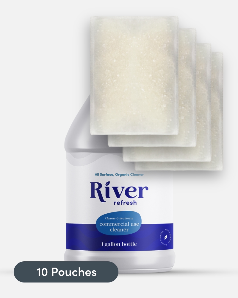 A bottle of river softener next to four bags.